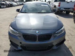 2016 BMW 2 Series M235i with VIN WBA1J7C52GV359958, listed as a Copart auction lot 65937374 with 82,231 mi miles and Salvage title. Bid and sale history available at DreamBid. Image 5.