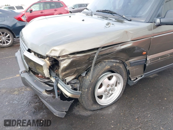 1997 Land Rover Range Rover with VIN SALPV124XVA360487, listed as a IAAI auction lot 41817163 with 141,344 mi miles and . Bid and sale history available at DreamBid. Image 6.