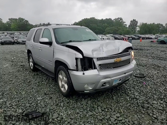 2012 Chevrolet Tahoe LTZ с VIN 1GNSKCE04CR272829, выставлен на аукционе Copart как лот 59959525 с пробегом 164 690 миль миль и Списание • Salvage title. История ставок и продаж доступна на DreamBid. Изображение 14.