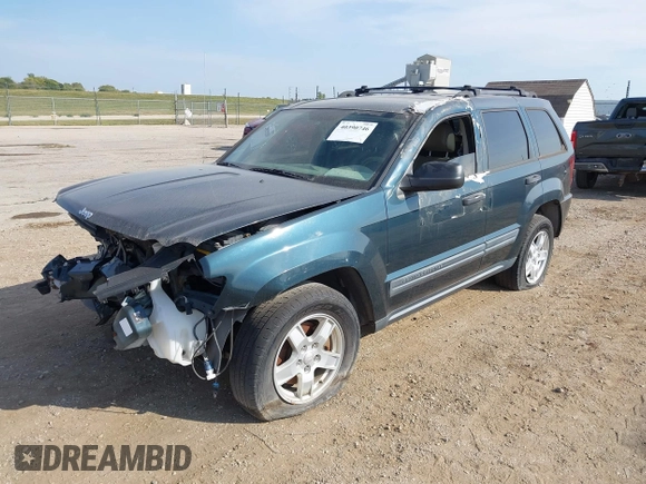 2005 Jeep Grand Cherokee Laredo z VIN 1J4GR48KX5C593240, wystawiony jako IAAI lot #40390746 z przebiegiem 177 646 mil mil oraz . Historia ofert i sprzedaży dostępna na DreamBid. Obrazek 2.