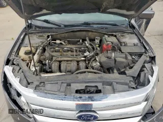 2012 Ford Fusion SE z VIN 3FAHP0HAXCR436084, wystawiony jako Copart lot #57390385 z przebiegiem 88 645 mil mil oraz Szkoda całkowita • Salvage title. Historia ofert i sprzedaży dostępna na DreamBid. Obrazek 11.