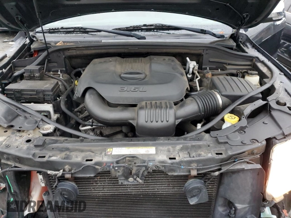 2011 Jeep Grand Cherokee Overland with VIN 1J4RS6GG5BC588562, listed as a Copart auction lot 84805424 with 150,030 mi miles and Salvage Title. Bid and sale history available at DreamBid. Image 12.