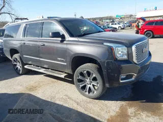 2015 GMC Yukon XL Denali with VIN 1GKS2JKJ9FR634771, listed as a IAAI auction lot 41676218 with 73,271 mi miles. Bid and sale history available at carsss.com. Image 1.