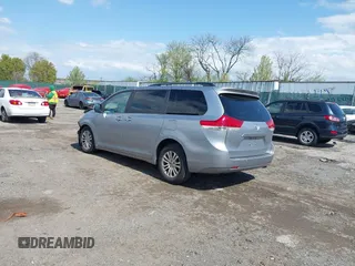 2013 Toyota Sienna XLE AAS with VIN 5TDYK3DC5DS375095, listed as a IAAI auction lot 42042334 with 130,633 mi miles. Bid and sale history available at carsss.com. Image 3.