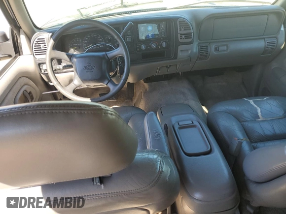 1999 Chevrolet Suburban with VIN 1GNEC16R1XJ394144, listed as a Copart auction lot 50418185 with 173,037 mi miles and Salvage title. Bid and sale history available at DreamBid. Image 8.
