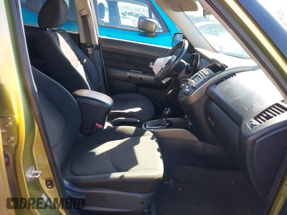 2012 Kia Soul + with VIN KNDJT2A65C7403543, listed as a IAAI auction lot 41633273 with 128,988 mi miles. Bid and sale history available at carsss.com. Image 5.