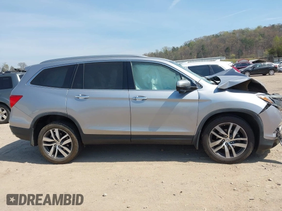 2017 Honda Pilot Touring with VIN 5FNYF6H98HB100335, listed as a IAAI auction lot 41907709 with 1 mi miles. Bid and sale history available at carsss.com. Image 13.