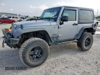 2014 Jeep Wrangler Sport with VIN 1C4AJWAG9EL323937, listed as a Copart auction lot 59991635 with 98,153 mi miles and Salvage title. Bid and sale history available at DreamBid. Image 1.