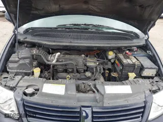 2005 Dodge Caravan SXT with VIN 2D4GP44L15R465487, listed as a IAAI auction lot 41946162 with 136,702 mi miles. Bid and sale history available at carsss.com. Image 10.