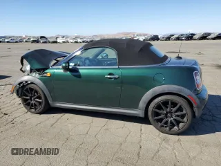2013 MINI Roadster z VIN WMWSY1C50DT625093, wystawiony jako Copart lot #72423424 z przebiegiem 104 620 mil mil oraz Szkody całkowita. Historia ofert i sprzedaży dostępna na DreamBid. Obrazek 2.