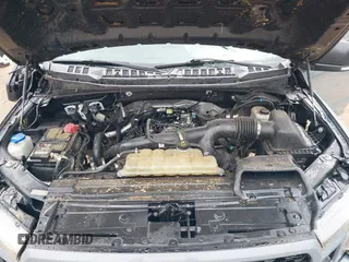 2019 Ford F-150 XL with VIN 1FTEW1EPXKKD78298, listed as a IAAI auction lot 41158508 with 76,676 mi miles and . Bid and sale history available at DreamBid. Image 10.