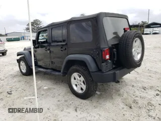 2018 Jeep Wrangler JK Unlimited Sport S with VIN 1C4BJWDG2JL859963, listed as a Copart auction lot 51613135 with 63,746 mi miles and Salvage Title. Bid and sale history available at carsss.com. Image 2.