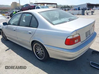 2001 BMW 5 Series 530iA with VIN WBADT63411CF01165, listed as a IAAI auction lot 42101589 with 151,243 mi miles. Bid and sale history available at carsss.com. Image 3.