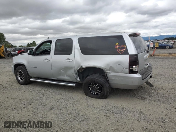 2013 Chevrolet Suburban LS with VIN 1GNSKHE77DR311408, listed as a Copart auction lot 59977394 with 216,161 mi miles and Salvage Title. Bid and sale history available at carsss.com. Image 2.