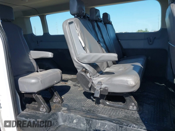 2019 Ford Transit Passenger XL z VIN 1FBZX2ZM8KKA75772, wystawiony jako IAAI lot #41990148 z przebiegiem 101 809 mil mil oraz . Historia ofert i sprzedaży dostępna na DreamBid. Obrazek 8.