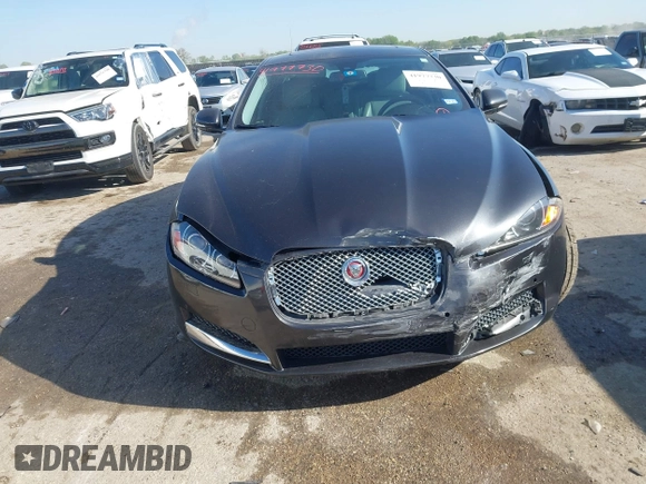2015 Jaguar XF T Premium with VIN SAJWA0FS0FPU43248, listed as a IAAI auction lot 41977730 with 105,086 mi miles and . Bid and sale history available at DreamBid. Image 12.