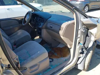 2000 Toyota Sienna CE with VIN 4T3ZF19CXYU187635, listed as a IAAI auction lot 41774700 with 98,463 mi miles. Bid and sale history available at carsss.com. Image 5.