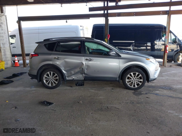 2018 Toyota RAV4 Limited with VIN 2T3DFREV4JW709049, listed as a IAAI auction lot 41596609 with 50,860 mi miles. Bid and sale history available at carsss.com. Image 13.