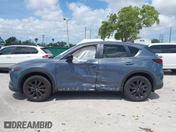 2024 Mazda CX-5 2.5 S Carbon Edition with VIN JM3KFBCL0R0507185, listed as a IAAI auction lot 41951557 with 10,293 mi miles. Bid and sale history available at carsss.com. Image 14.