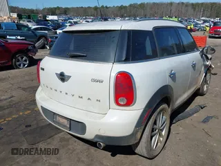 2014 MINI Countryman with VIN WMWZB3C52EWR42241, listed as a IAAI auction lot 41734963 with 121,325 mi miles and . Bid and sale history available at DreamBid. Image 4.