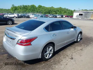 2015 Nissan Altima 2.5 z VIN 1N4AL3AP2FC591986, wystawiony jako IAAI lot #42172883 z przebiegiem 205 419 mil mil oraz . Historia ofert i sprzedaży dostępna na DreamBid. Obrazek 4.
