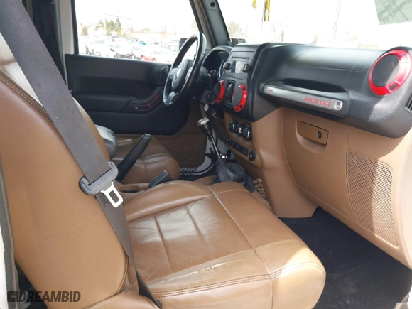 2012 Jeep Wrangler Unlimited Sahara with VIN 1C4BJWEG9CL220965, listed as a IAAI auction lot 41902295 with 120,492 mi miles. Bid and sale history available at carsss.com. Image 5.