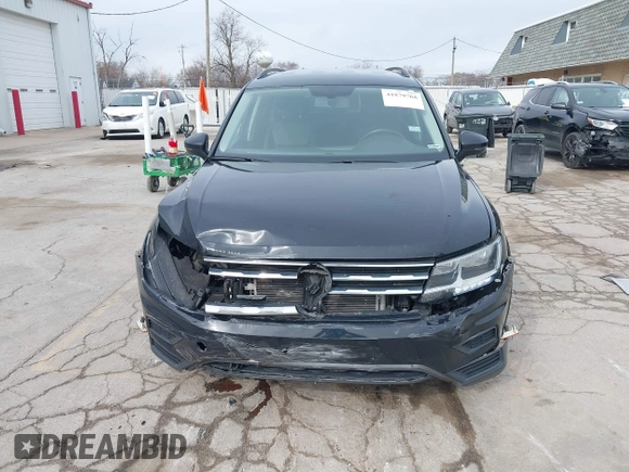 2021 Volkswagen Tiguan SE with VIN 3VV2B7AXXMM057849, listed as a IAAI auction lot 41879768 with 88,353 mi miles and . Bid and sale history available at DreamBid. Image 12.