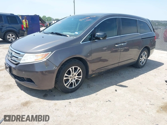 2012 Honda Odyssey EX with VIN 5FNRL5H41CB011940, listed as a IAAI auction lot 42033966 with 182,996 mi miles and . Bid and sale history available at DreamBid. Image 17.