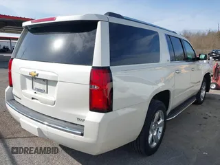 2015 Chevrolet Suburban LTZ with VIN 1GNSCKKC2FR741040, listed as a IAAI auction lot 41709574 with 87,795 mi miles and . Bid and sale history available at DreamBid. Image 4.