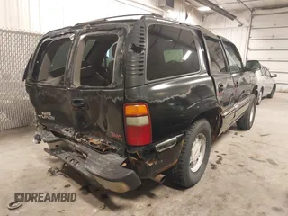 2000 GMC Yukon SLT with VIN 1GKEK13T1YJ176643, listed as a IAAI auction lot 41729346 with 265,124 mi miles. Bid and sale history available at carsss.com. Image 4.