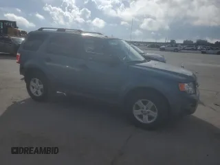 2011 Ford Escape Hybrid with VIN 1FMCU5K37BKC69587, listed as a Copart auction lot 68494964 with 126,353 mi miles and Salvage title. Bid and sale history available at DreamBid. Image 4.