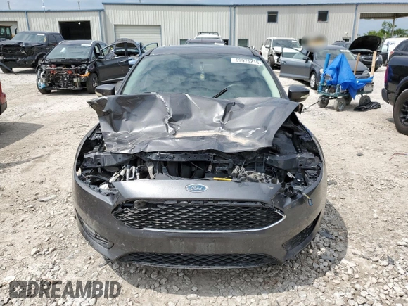 2015 Ford Focus SE z VIN 1FADP3F24FL357329, wystawiony jako Copart lot #59976215 z przebiegiem 182 407 mil mil oraz Czysty tytuł • Clean title. Historia ofert i sprzedaży dostępna na DreamBid. Obrazek 5.