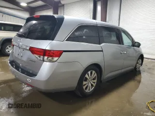 2016 Honda Odyssey SE with VIN 5FNRL5H31GB109718, listed as a Copart auction lot 54689915 with 48,933 mi miles and Salvage Title. Bid and sale history available at DreamBid. Image 3.