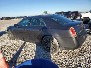 2013 Chrysler 300 with VIN 2C3CCABT0DH686435, listed as a Copart auction lot 87364144 with 149,250 mi miles and Salvage Title. Bid and sale history available at carsss.com. Image 2.