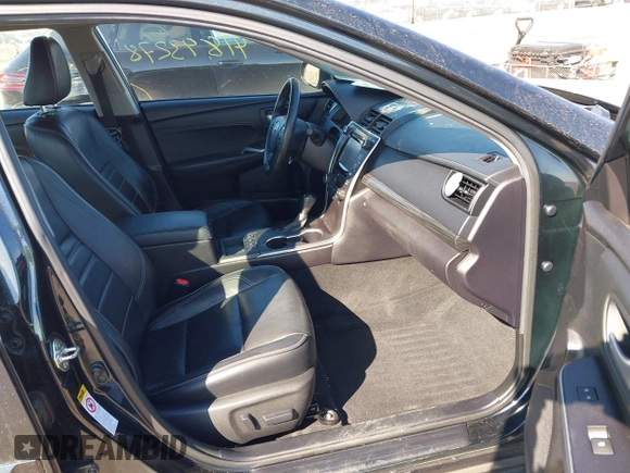 2015 Toyota Camry LE z VIN 4T1BD1FK8FU148065, wystawiony jako IAAI lot #41843278 z przebiegiem 91 137 mil mil oraz . Historia ofert i sprzedaży dostępna na DreamBid. Obrazek 5.