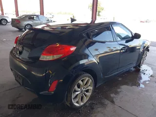 2012 Hyundai Veloster w/Gray Int z VIN KMHTC6AD0CU062046, wystawiony jako IAAI lot #42182993 z przebiegiem 148 574 mil mil oraz . Historia ofert i sprzedaży dostępna na DreamBid. Obrazek 4.