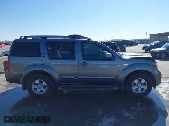 2005 Nissan Pathfinder SE with VIN 5N1AR18U45C751529, listed as a IAAI auction lot 41009894 with 167,023 mi miles. Bid and sale history available at carsss.com. Image 13.