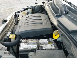 2019 Dodge Grand Caravan SXT with VIN 2C4RDGCG1KR740033, listed as a IAAI auction lot 41208476 with 182,575 mi miles and . Bid and sale history available at DreamBid. Image 20.