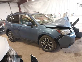 2018 Subaru Forester Premium with VIN JF2SJGECXJH606668, listed as a IAAI auction lot 41879710 with 64,910 mi miles. Bid and sale history available at carsss.com. Image 13.