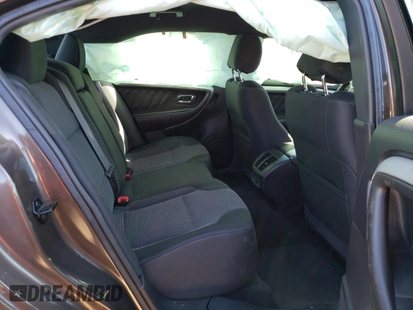 2016 Ford Taurus SEL с VIN 1FAHP2H83GG132648, выставлен на аукционе Copart как лот 36502393 с пробегом 114 283 миль миль и Списание • Salvage title. История ставок и продаж доступна на DreamBid. Изображение 10.