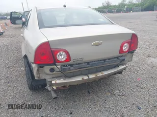 2011 Chevrolet Malibu 1LS with VIN 1G1ZB5E14BF326893, listed as a IAAI auction lot 42175943 with 163,887 mi miles and . Bid and sale history available at DreamBid. Image 6.