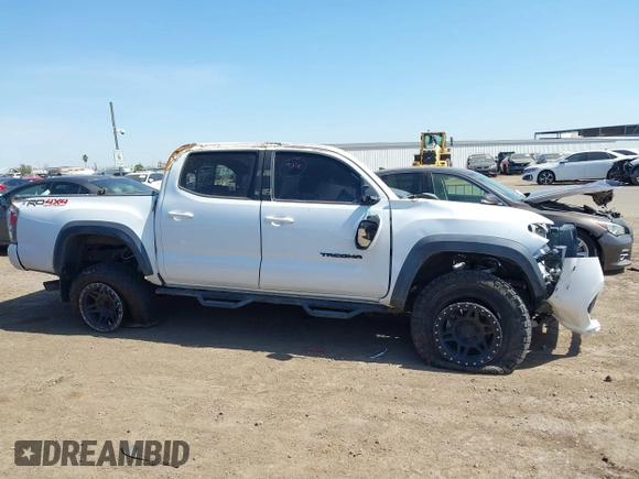 2020 Toyota Tacoma SR5 with VIN 3TMCZ5ANXLM297886, listed as a IAAI auction lot 41965591 with Not provided miles and . Bid and sale history available at DreamBid. Image 12.