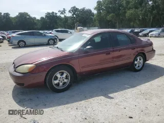 2007 Ford Taurus SE with VIN 1FAFP53U17A151246, listed as a Copart auction lot 60221955 with 284,321 mi miles and Salvage title. Bid and sale history available at DreamBid. Image 1.
