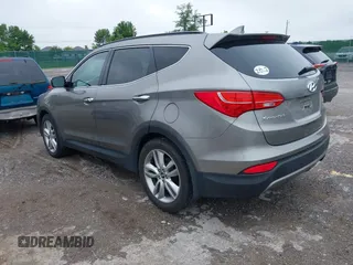 2014 Hyundai Santa Fe z VIN 5XYZW3LA2EG217854, wystawiony jako IAAI lot #42318822 z przebiegiem 120 234 mil mil oraz . Historia ofert i sprzedaży dostępna na DreamBid. Obrazek 3.