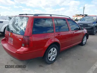 2005 Volkswagen Jetta GLS z VIN WVWSR61J45W018787, wystawiony jako IAAI lot #41703316 z przebiegiem 234 961 mil mil oraz . Historia ofert i sprzedaży dostępna na DreamBid. Obrazek 4.