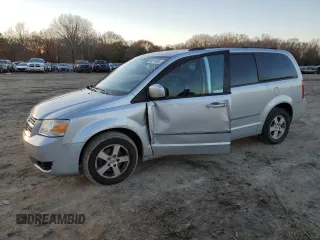 2010 Dodge Grand Caravan SXT with VIN 2D4RN5D16AR496795, listed as a Copart auction lot 83374834 with 99,902 mi miles and Salvage Title. Bid and sale history available at DreamBid. Image 1.