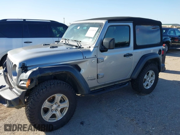 2018 Jeep Wrangler Sport S with VIN 1C4GJXAG0JW156196, listed as a IAAI auction lot 41193078 with 80,428 mi miles and . Bid and sale history available at DreamBid. Image 2.