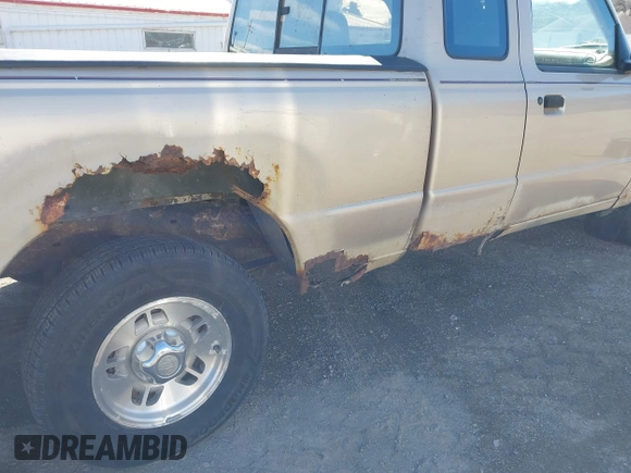 1996 Ford Ranger XL z VIN 1FTCR14U2TPB53948, wystawiony jako IAAI lot #41866170 z przebiegiem 164 675 mil mil oraz . Historia ofert i sprzedaży dostępna na DreamBid. Obrazek 14.