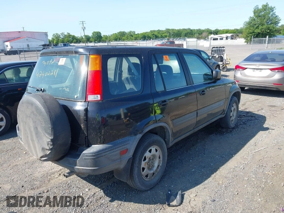 1999 Honda CR-V LX z VIN JHLRD2842XC010409, wystawiony jako IAAI lot #42402281 z przebiegiem 265 901 mil mil oraz . Historia ofert i sprzedaży dostępna na DreamBid. Obrazek 4.
