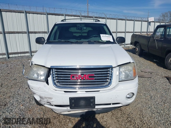 2006 GMC Envoy SLT with VIN 1GKDS13S062128531, listed as a IAAI auction lot 41458983 with 119,385 mi miles. Bid and sale history available at carsss.com. Image 12.